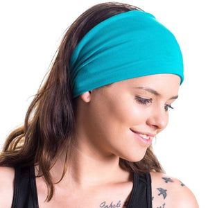 Women wearing aqua bamboo headband looking at her shoulder