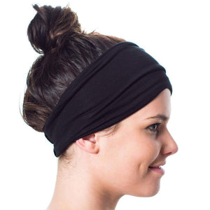 Women looking sideways wearing black bamboo headband