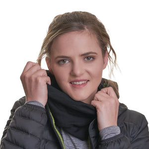 women wearing versatile black merino wool beanie as a neck warmer