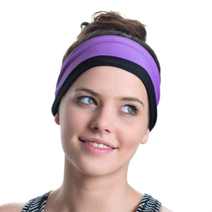 Women wearing a purple/lilac reversible workout headband