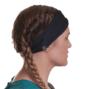 Side view of women wearing black exercise headband with braids in her hair