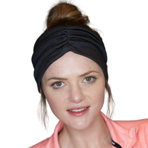 Women wearing black moisture-wicking sports sweatband