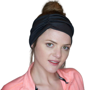 Women wearing black moisture-wicking sports sweatband