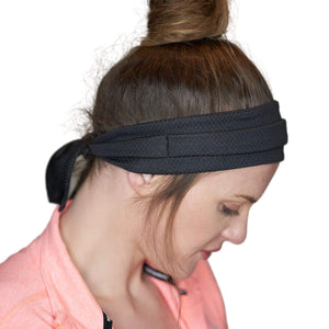 Women wearing blue adjustable tie behind workout headband