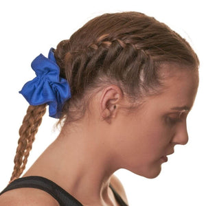 side view of women wearing blue gym scrunchie