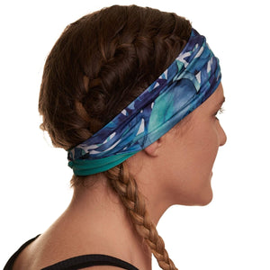 Side view of women wearing blue and white patterned sports sweatband