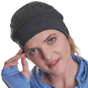 Close up of women looking into the camera wearing Australian made merino wool black beanie