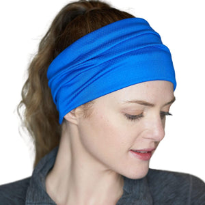 Women wearing royal blue moisture-wicking sports headband