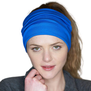 Women wearing royal blue workout sweatband