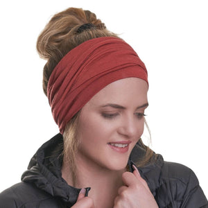 Women wearing multi use ZQ merino wool beanie as a headband.