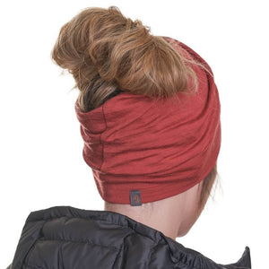 Back view of women wearing ZQ merino wool ponytail friendly beanie