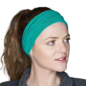 Women wearing turquoise bamboo sports headband