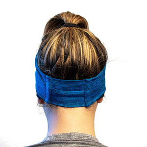 women wearing blue-black reversible winter sports headband