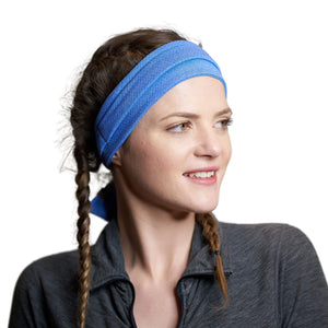 Women wearing blue adjustable tie behind exercise headband