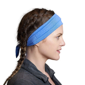 Women wearing blue adjustable tie behind sports sweatband