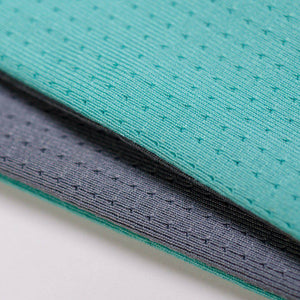 Close up of fabric used for  aqua/gray reversible running headband