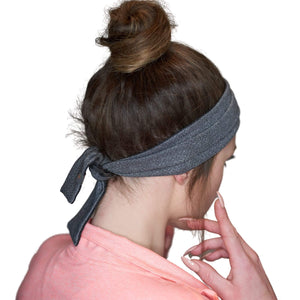 Women wearing reversible gray/black adjustable tie behind running sweatband