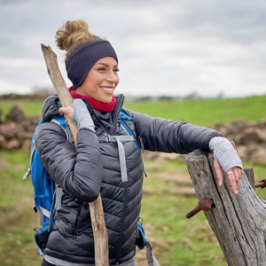 Women hiking wearing black & red Polartec fleecy neck warmer