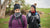 two women hiking in recycled winter headband and neck warmer