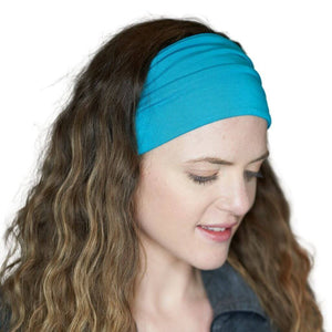 Women looing to the ground wearing aqua bamboo workout sport bands