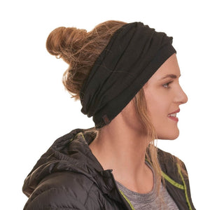 women wearing versatile black merino wool beanie as a winter headband
