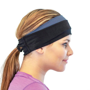 women wearing black-gray reversible winter sports headband