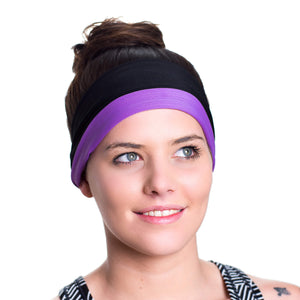 Women wearing a purple/lilac reversible sports sweatband