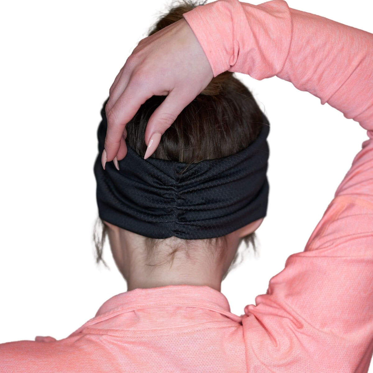 Women wearing black moisture-wicking workout sweatband