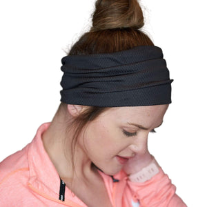 Women wearing black sports headband