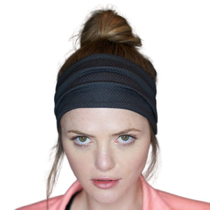 Women wearing black adjustable tie behind exercise headband