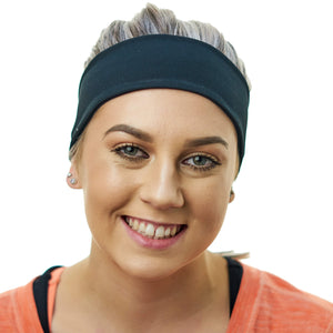 Women wearing black tie behind sports headband