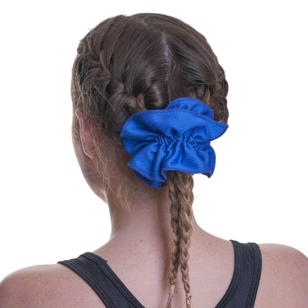 women wearing bright blue workout scrunchie