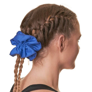 women wearing bright blue workout scrunchie