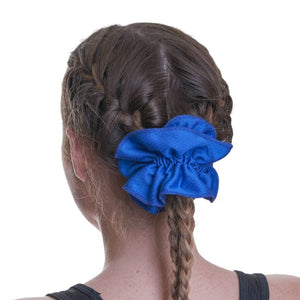 Back view of women wearing blue running scrunchie