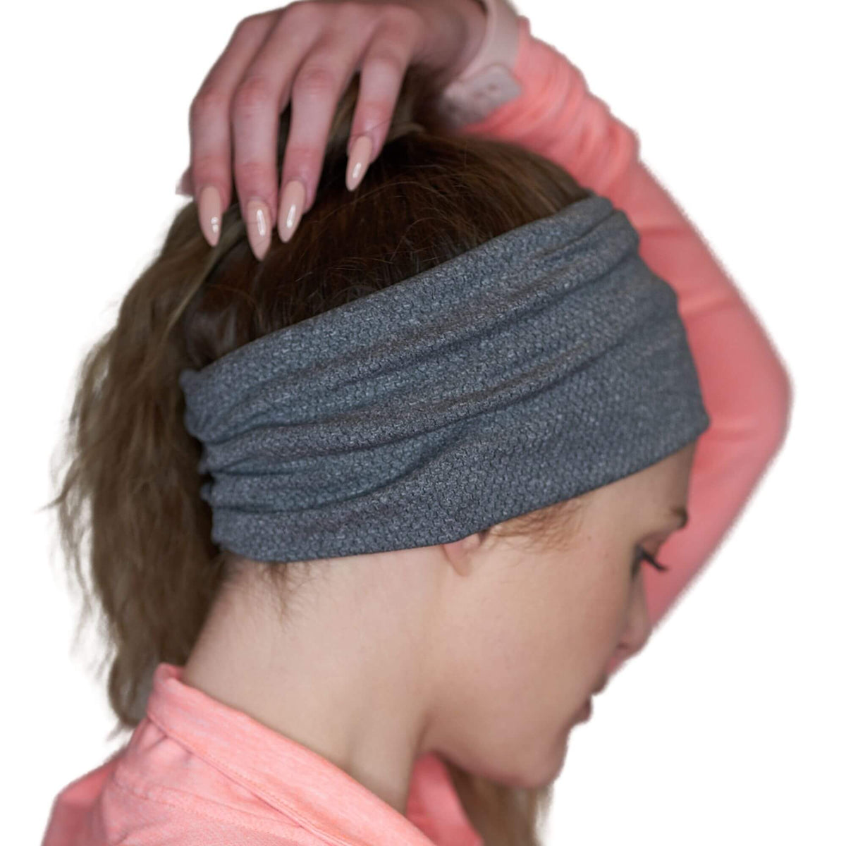 Women wearing gray moisture-wicking sports sweatband