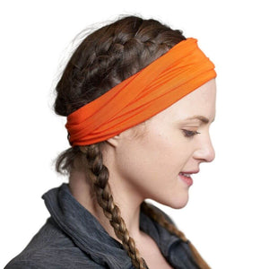 Side view of women wearing flame coloured yoga bamboo headband
