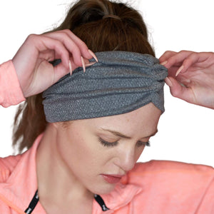 Women wearing gray sports sweatband