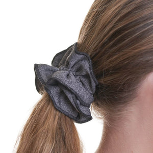 Close up of grey scrunchie with black trim