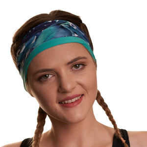 Women wearing patterned blue and white wave exercise headband