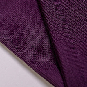 Close up of plum coloured bamboo fabric used to make sports headbands