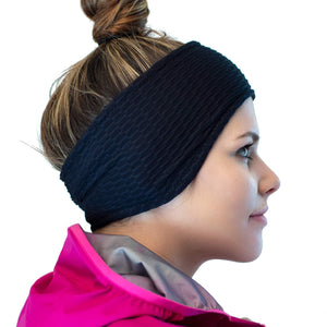 Side view of women wearing black recycled Polartec fleecy lined ear warmers