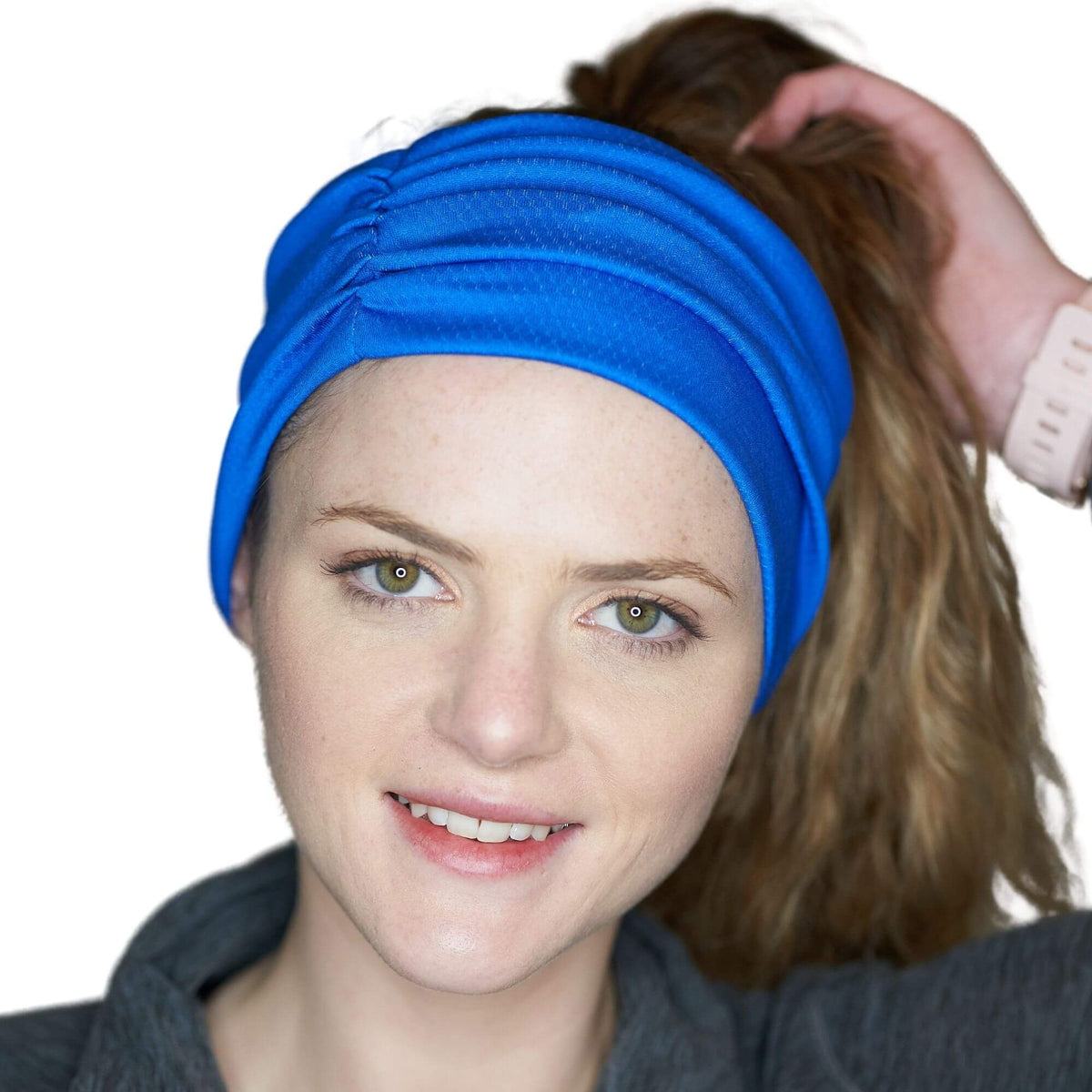 Women wearing royal blue moisture-wicking workout headband