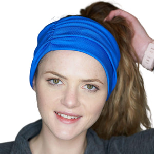 Women wearing royal blue moisture-wicking workout headband