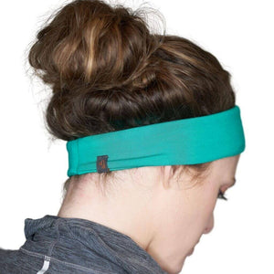 Back view of women wearing turquoise bamboo yoga headband