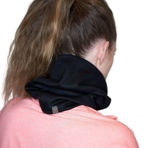 Back view of women wearing black merino wool neck warmer