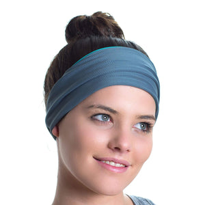 Women wearing a aqua/gray reversible active headband