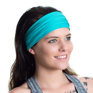 Women wearing a aqua/gray reversible sports headband