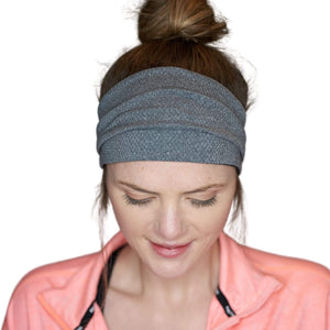 Women wearing gray reversible adjustable tie behind sports headband