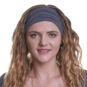 Women wearing bamboo fashion headband with curly hair down