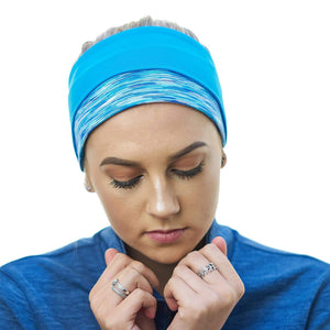 women wearing blue-aqua reversible winter sports headband